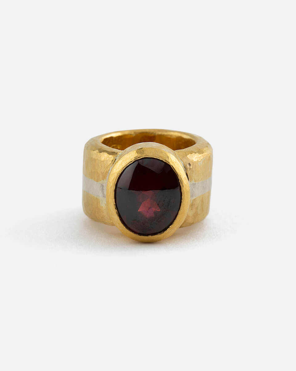 bold ring with garnet cabochon