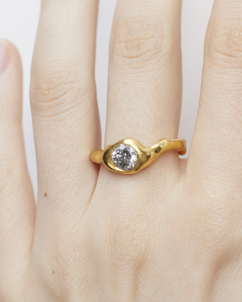 melted fine gold ring with 1 ct diamond